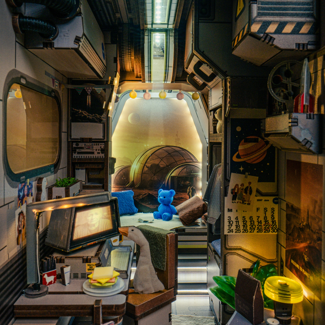 Mars Revelation 62 interior with astronaut quarters, blue teddy bear and Planet 62 window